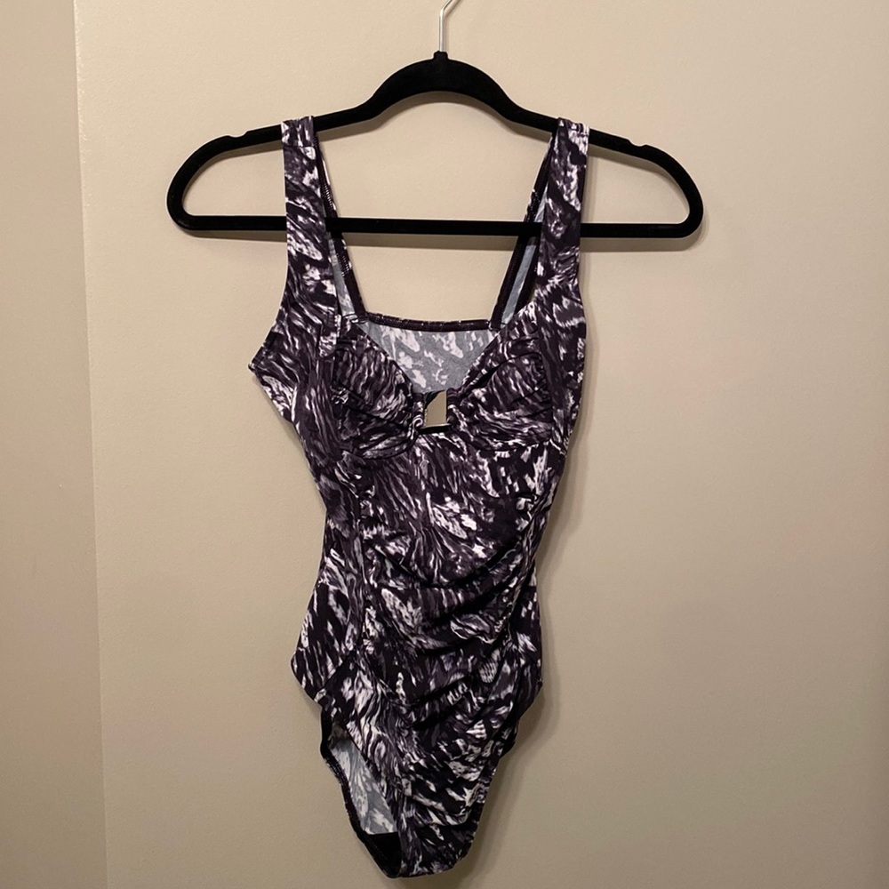 Women’s Calvin Klein one piece swim suit. NEVER WORN